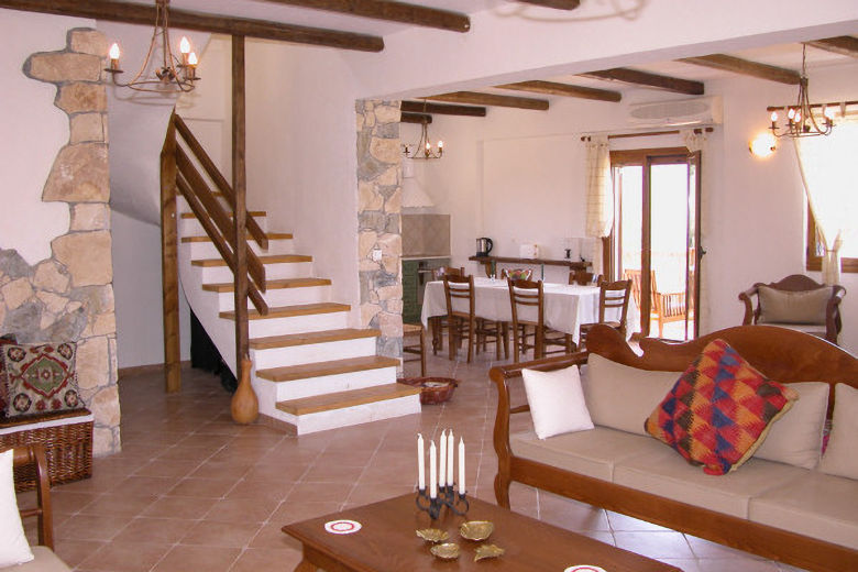 Open-plan living-dining area in Villa Irini