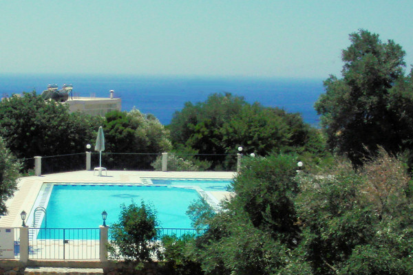 View across the pool to the sea
