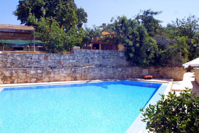View across the pool to the small neighbouring taverna