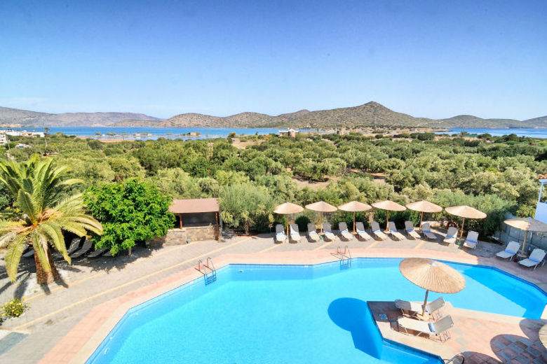 View across the pool to the bay and Elounda Island